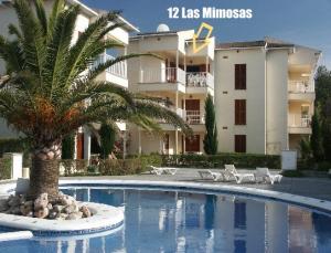 view of apartment from pool