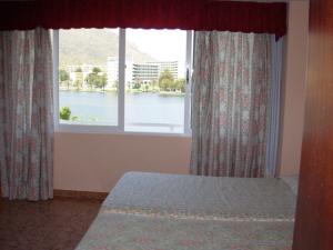 Bedroom with lake & mountain views