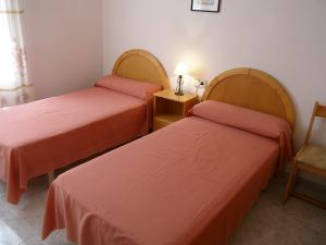 one of the twin bedrooms