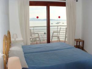 Bedroom with balcony doors